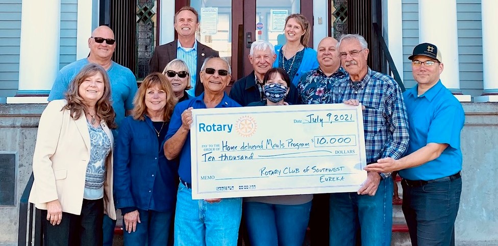 SW Rotary members present check to HSRC